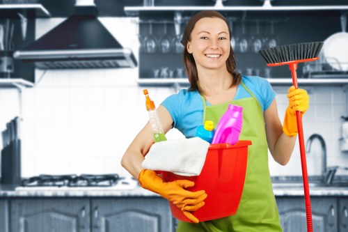 Professional cleaner working in a Barnes rental property